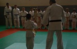 la flamme olympique dans le Dojo